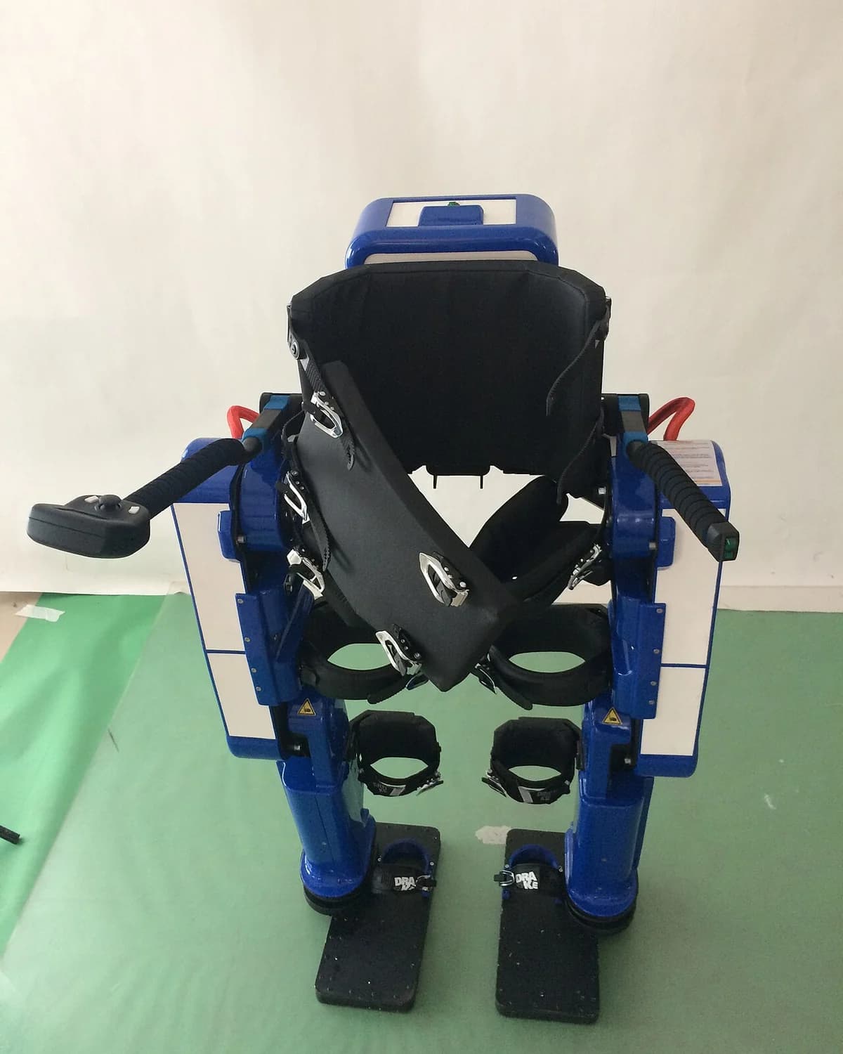 ExoLite passive exoskeleton displayed in a clinical setting.